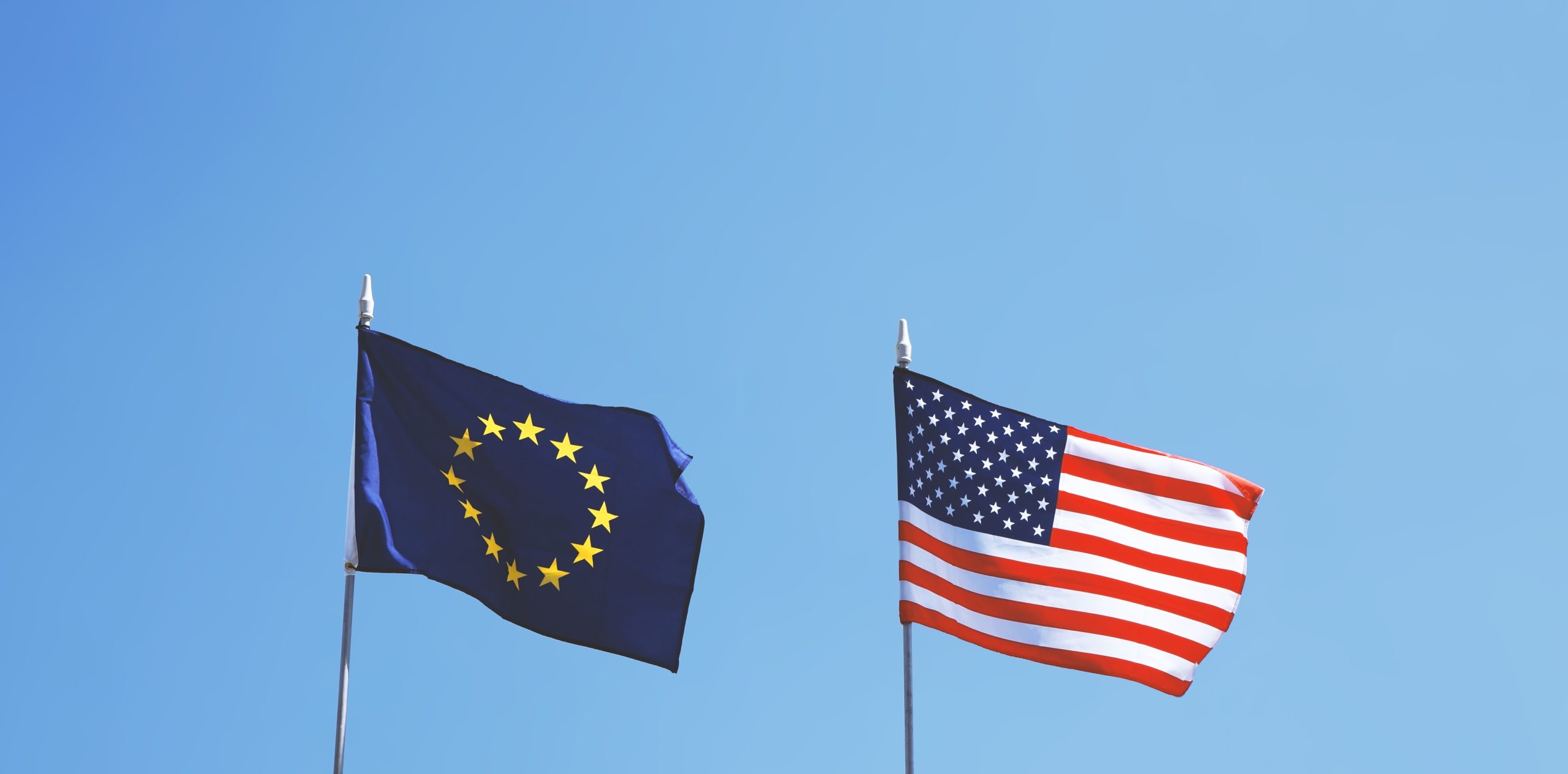 flags of Europe and United States of America next to each other